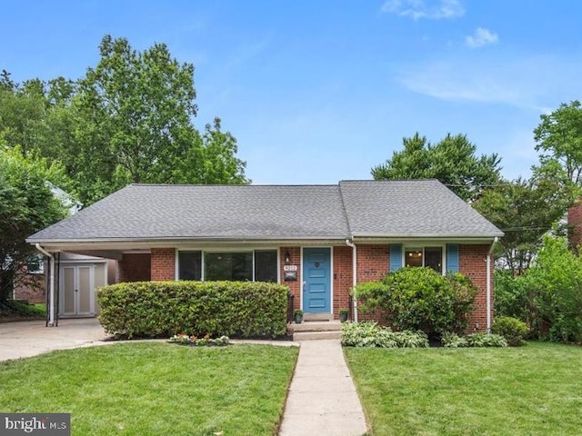 9212 E Parkhill Dr, Bethesda, MD 20814 - single story home with a front yard, brick siding, driveway, and roof with shingles