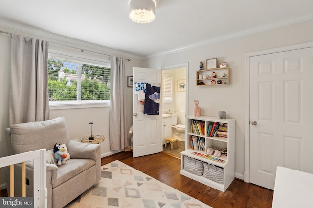 9212 E Parkhill Dr, Bethesda, MD 20814 - bedroom with dark wood-style flooring, ornamental molding, baseboards, and ensuite bath