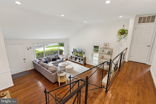 9212 E Parkhill Dr, Bethesda, MD 20814 - living area featuring vaulted ceiling, wood finished floors, recessed lighting, and baseboards