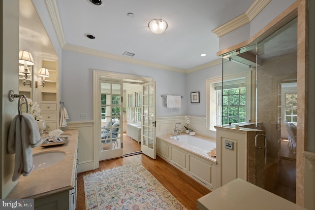 601 Maplewood Rd, Wayne, PA 19087 - full bath featuring wainscoting, a bath, a shower stall, ornamental molding, and vanity
