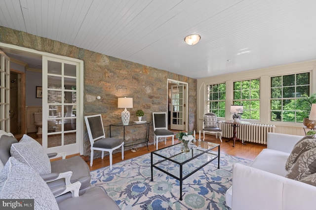 601 Maplewood Rd, Wayne, PA 19087 - living area featuring radiator and wood finished floors
