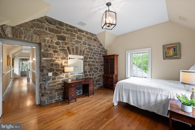 601 Maplewood Rd, Wayne, PA 19087 - bedroom with vaulted ceiling and wood finished floors
