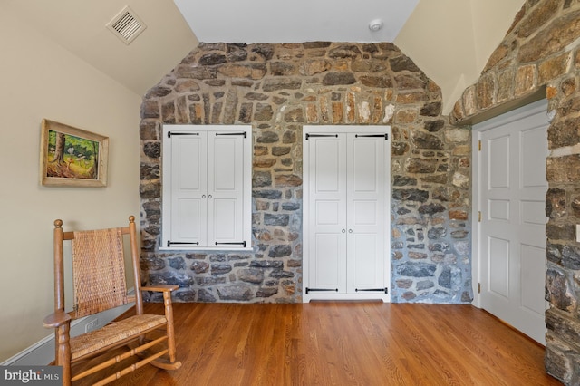601 Maplewood Rd, Wayne, PA 19087 - unfurnished room with vaulted ceiling and wood finished floors
