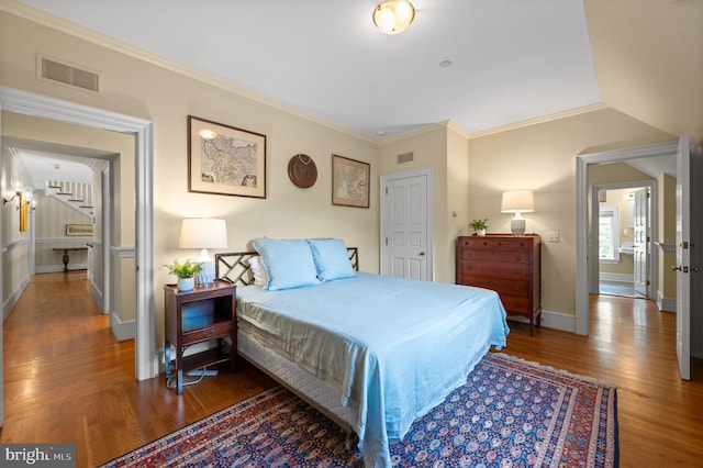 601 Maplewood Rd, Wayne, PA 19087 - bedroom with wood finished floors, ornamental molding, and baseboards
