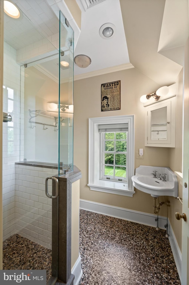 601 Maplewood Rd, Wayne, PA 19087 - full bathroom with baseboards, a shower stall, crown molding, and a sink
