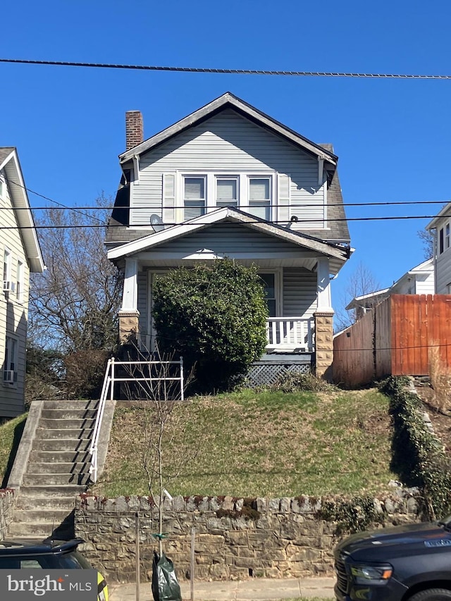 3505 24th St NE, Washington, DC 20018 - view of front of property featuring stairs, a chimney, and a porch