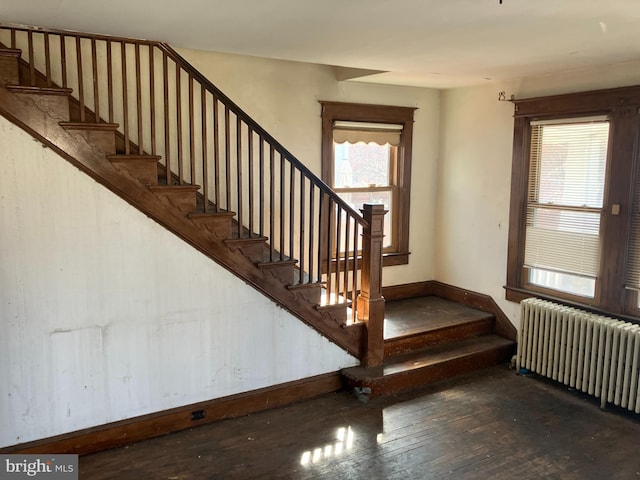3505 24th St NE, Washington, DC 20018 - stairs with radiator heating unit, hardwood / wood-style floors, and baseboards