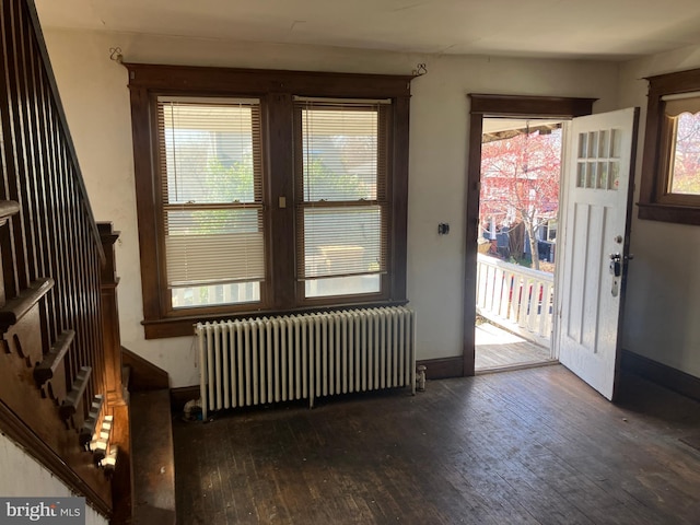 3505 24th St NE, Washington, DC 20018 - foyer with radiator heating unit, hardwood / wood-style flooring, and plenty of natural light