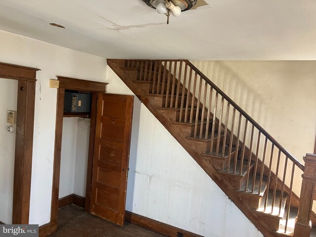 3505 24th St NE, Washington, DC 20018 - staircase featuring baseboards and ceiling fan