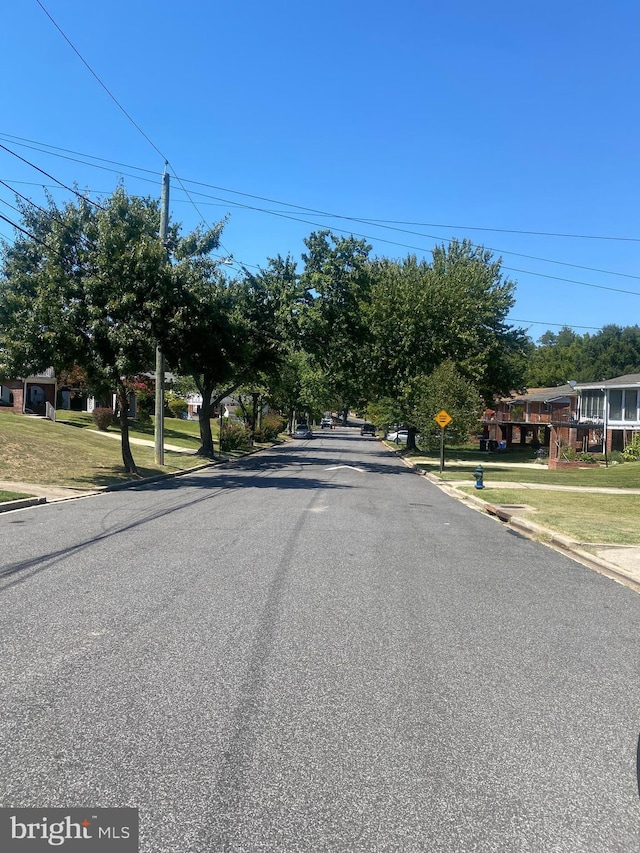 3240 Pope St SE, Washington, DC 20020 - view of asphalt street featuring curbs and traffic signs