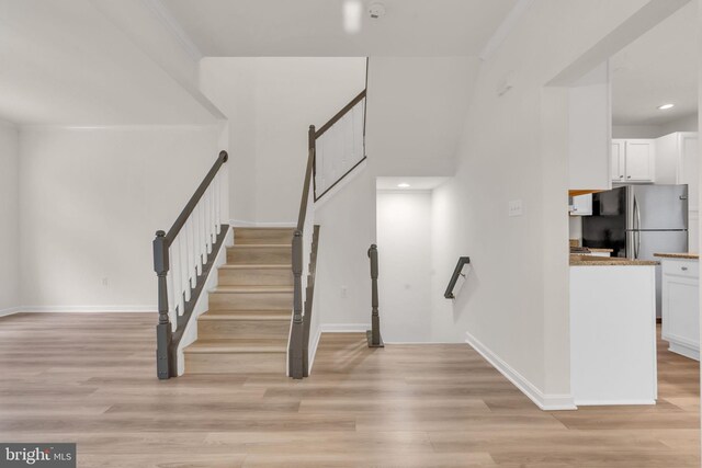 20524 Blue Heron Ter, Sterling, VA 20165 - stairway with wood finished floors and recessed lighting