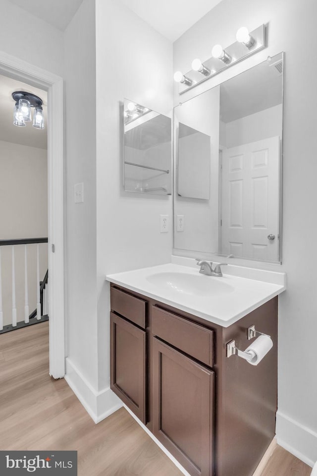 20524 Blue Heron Ter, Sterling, VA 20165 - bathroom featuring vanity and wood finished floors