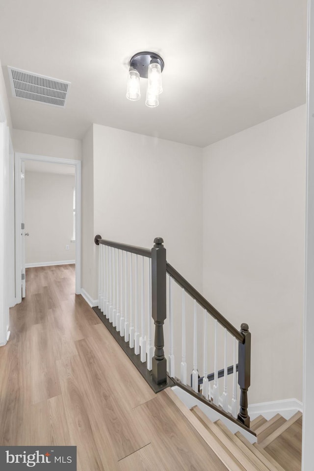 20524 Blue Heron Ter, Sterling, VA 20165 - hall with an upstairs landing and wood finished floors