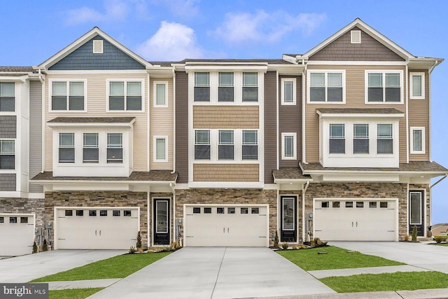 522 Bartholomew Dr, Waynesboro, PA 17268 - townhome / multi-family property with a garage, driveway, and stone siding