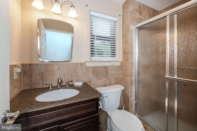 26 Hillcroft Rd, Berlin, NJ 08009 - bathroom featuring toilet, vanity, a shower stall, and tile walls