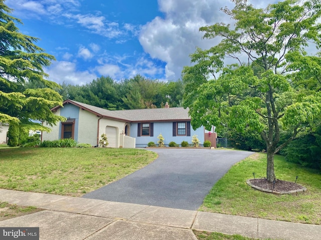 26 Hillcroft Rd, Berlin, NJ 08009 - single story home with driveway, an attached garage, and a front yard