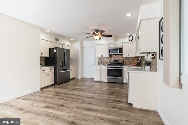 26 Hillcroft Rd, Berlin, NJ 08009 - kitchen featuring stainless steel appliances, backsplash, a ceiling fan, recessed lighting, and light countertops