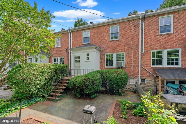 546 W University Pkwy, Baltimore, MD 21210 - back of property with brick siding and cooling unit