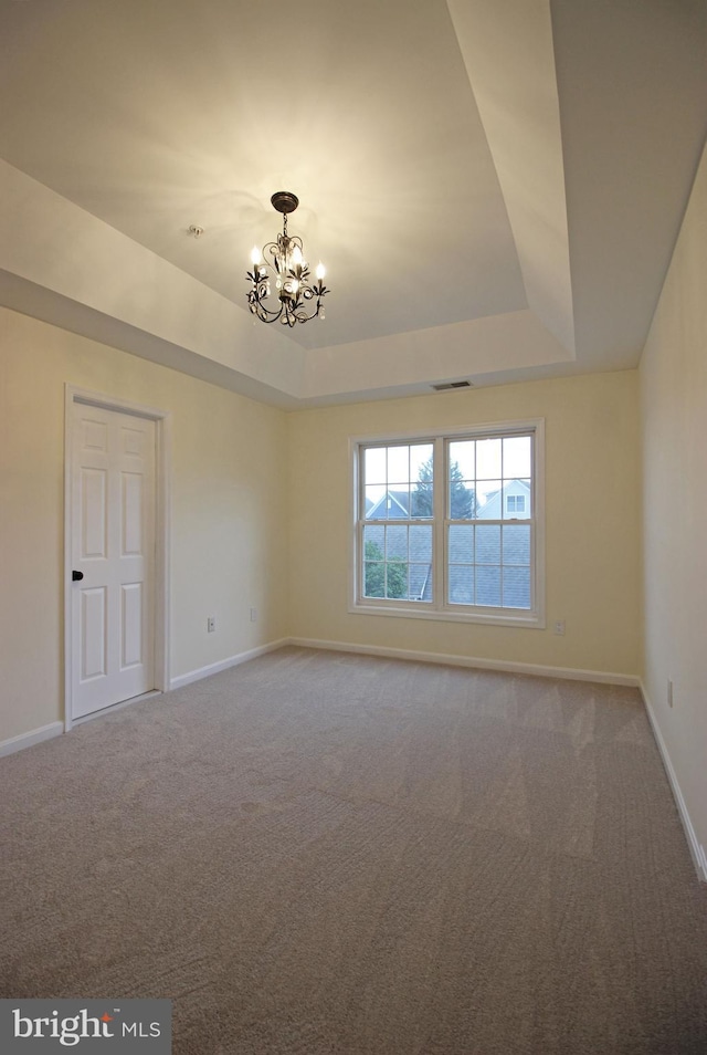 3655 Islington St, Frederick, MD 21704 - unfurnished room with a tray ceiling, a chandelier, carpet flooring, and baseboards
