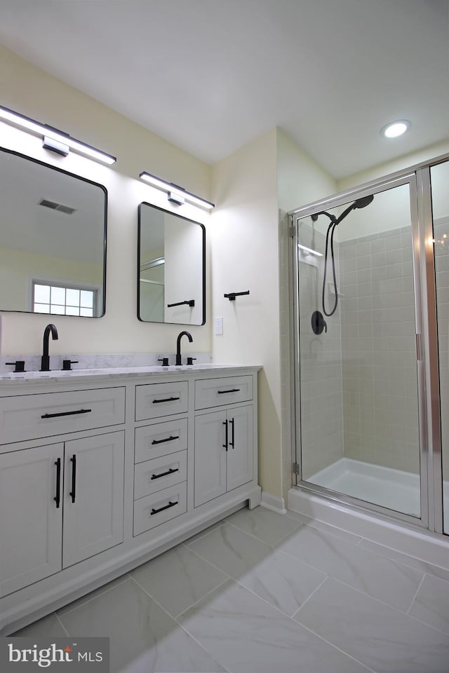 3655 Islington St, Frederick, MD 21704 - full bathroom featuring a stall shower, double vanity, marble finish flooring, and recessed lighting