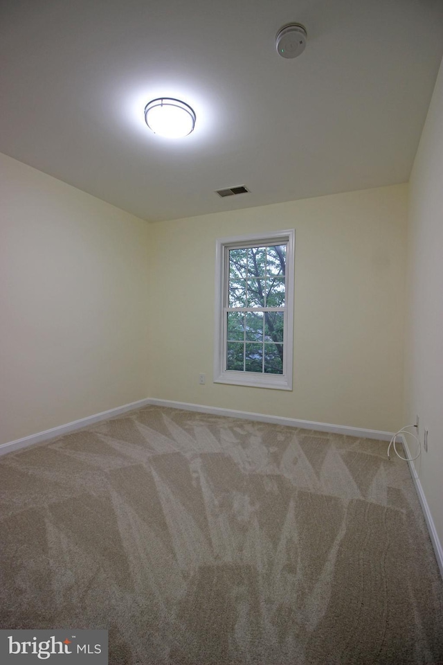 3655 Islington St, Frederick, MD 21704 - empty room featuring carpet, baseboards, and a smoke detector