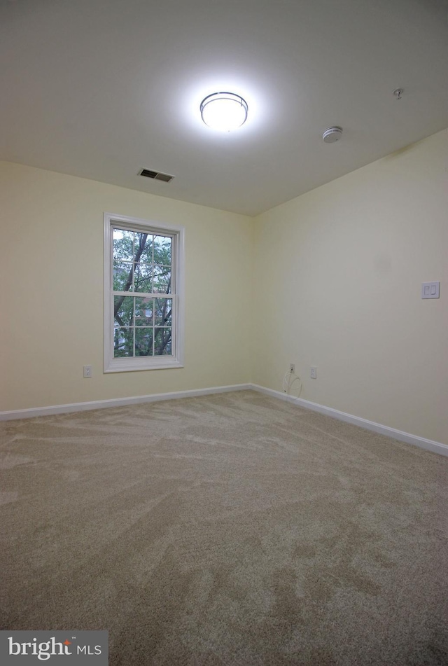 3655 Islington St, Frederick, MD 21704 - carpeted empty room featuring baseboards, fire sprinkler in ceiling, and a smoke detector