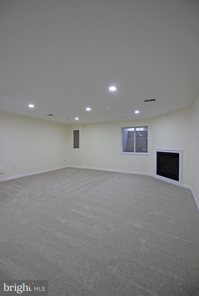 3655 Islington St, Frederick, MD 21704 - finished basement with recessed lighting, carpet, baseboards, a fireplace, and electric panel