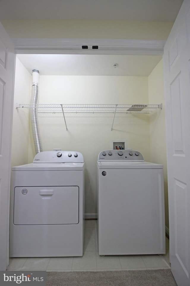 3655 Islington St, Frederick, MD 21704 - washroom featuring separate washer and dryer and light tile patterned floors