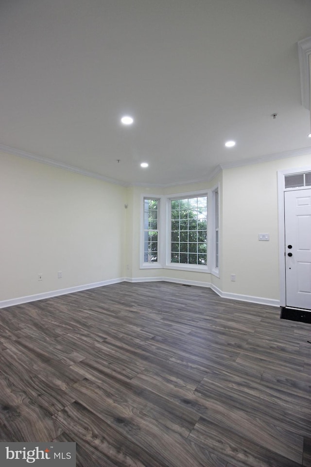 3655 Islington St, Frederick, MD 21704 - unfurnished living room with baseboards, ornamental molding, recessed lighting, and dark wood-type flooring