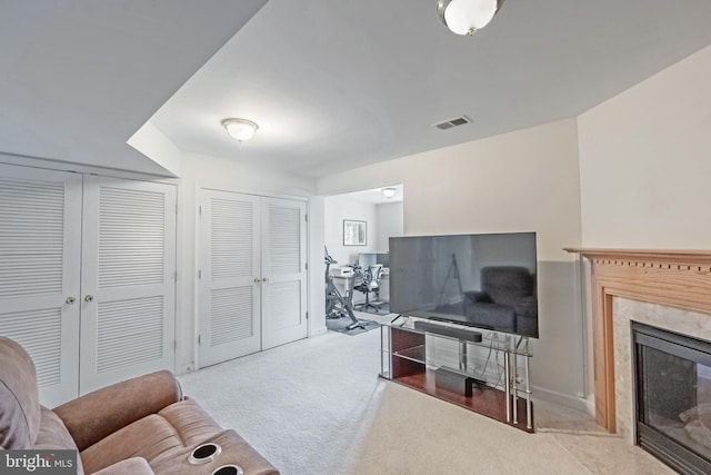 222 Hawks View Sq SE, Leesburg, VA 20175 - living area with carpet flooring, a high end fireplace, and baseboards