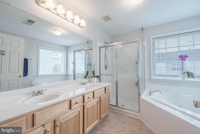 222 Hawks View Sq SE, Leesburg, VA 20175 - full bath featuring a whirlpool tub, a shower stall, double vanity, and tile patterned floors
