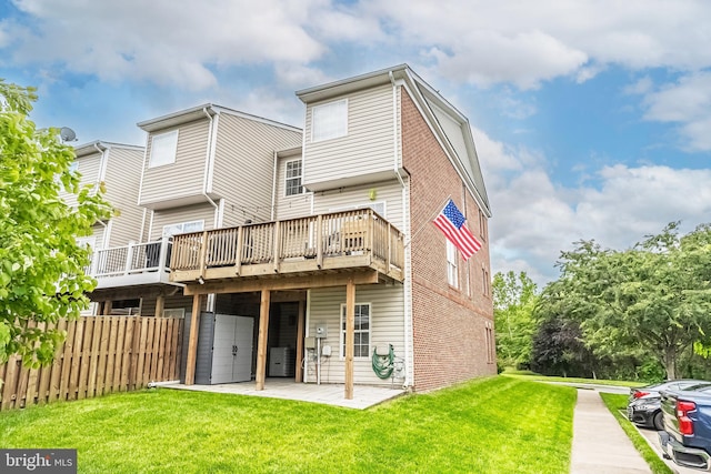 222 Hawks View Sq SE, Leesburg, VA 20175 - rear view of house featuring brick siding and a wooden deck