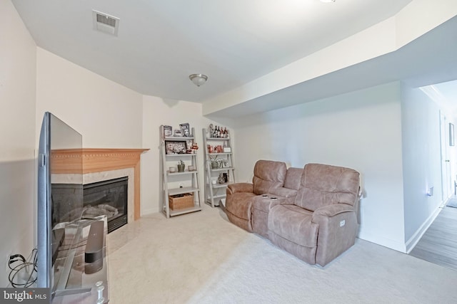 222 Hawks View Sq SE, Leesburg, VA 20175 - living room featuring a high end fireplace, carpet floors, and baseboards