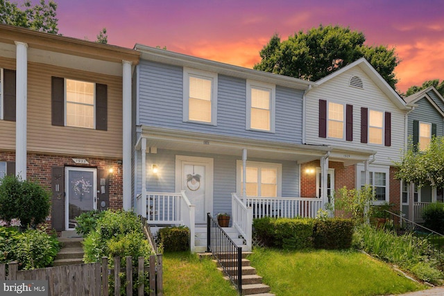 1931 Fort Monroe Ct, Dumfries, VA 22026 - view of property featuring a porch and brick siding