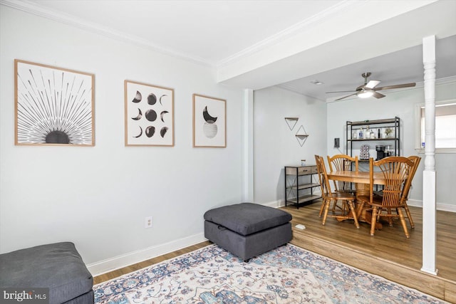 1931 Fort Monroe Ct, Dumfries, VA 22026 - dining space featuring crown molding, wood finished floors, and ceiling fan