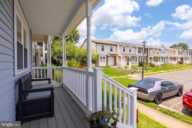 1931 Fort Monroe Ct, Dumfries, VA 22026 - wooden porch featuring a residential view