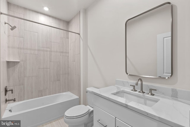 23062 Soaring Heights Ter, Ashburn, VA 20148 - bathroom featuring vanity, toilet, and washtub / shower combination