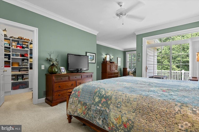 111 Brookline Ct, Avondale, PA 19311 - carpeted bedroom featuring crown molding, a walk in closet, access to exterior, a ceiling fan, and a closet