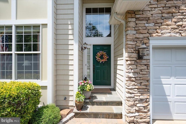 111 Brookline Ct, Avondale, PA 19311 - entrance to property featuring stone siding and a garage