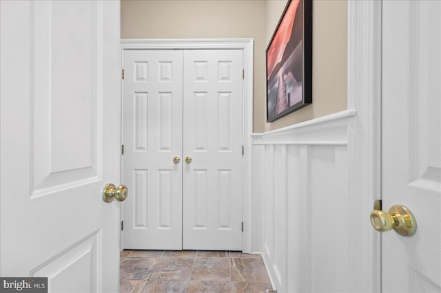 111 Brookline Ct, Avondale, PA 19311 - hallway with wainscoting and stone finish floors
