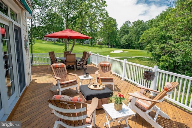 111 Brookline Ct, Avondale, PA 19311 - deck with outdoor dining space, a lawn, view of golf course, and view of wooded area
