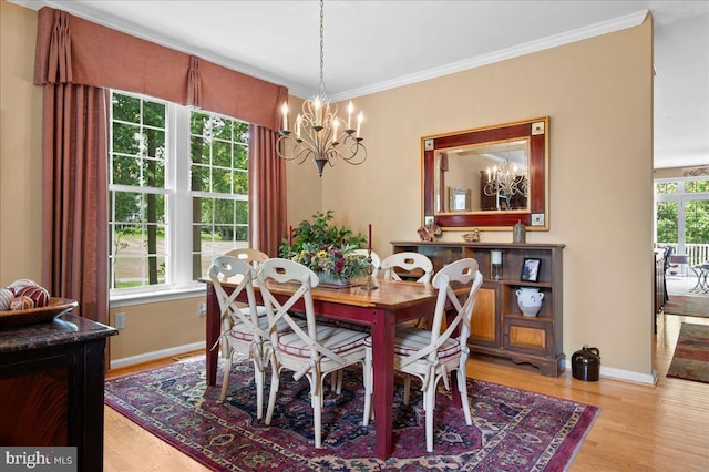 111 Brookline Ct, Avondale, PA 19311 - dining space featuring a chandelier, light wood-type flooring, crown molding, and baseboards