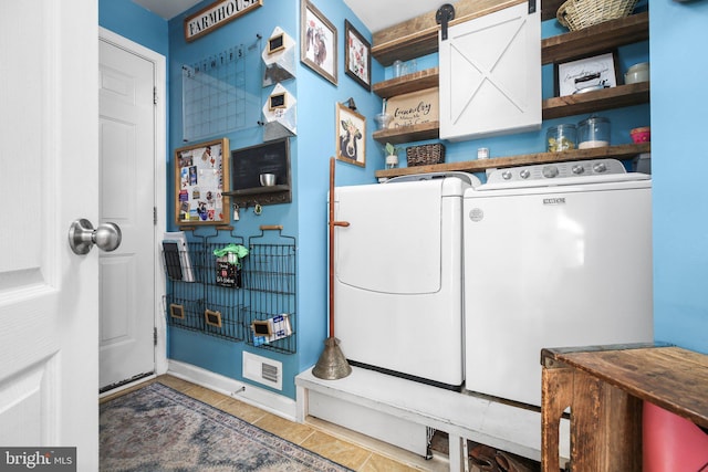 550 Long Meadow Dr, Fredericksburg, VA 22406 - laundry room featuring washer and clothes dryer and tile patterned floors