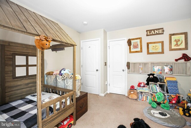 550 Long Meadow Dr, Fredericksburg, VA 22406 - carpeted bedroom featuring baseboards