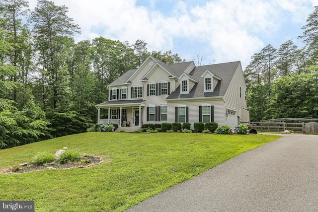 550 Long Meadow Dr, Fredericksburg, VA 22406 - colonial-style house featuring a porch, an attached garage, and a shingled roof