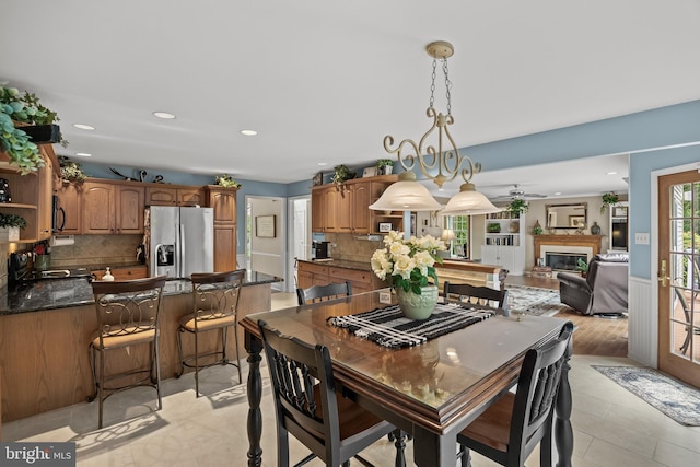 4 False Heather Way, Medford, NJ 08055 - dining space featuring recessed lighting, a glass covered fireplace, and a ceiling fan