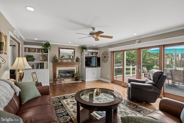 4 False Heather Way, Medford, NJ 08055 - living area featuring a fireplace, a ceiling fan, wood finished floors, recessed lighting, and ornamental molding
