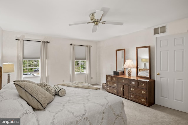 4 False Heather Way, Medford, NJ 08055 - bedroom with multiple windows, light carpet, and ceiling fan