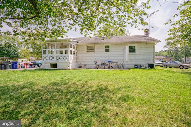 28 Malaga Ter, Malaga, NJ 08328 - back of house with a sunroom, a chimney, and a yard