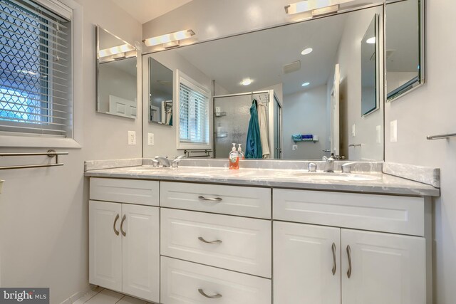2409 Lightfoot Dr, Baltimore, MD 21209 - bathroom with a shower stall and double vanity